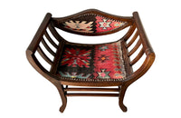 Stylish pair of early 20th century French armchairs studded and upholstered in Kilim. Circa 1920 in the Arts & Crafts Style. AD & PS Antiques