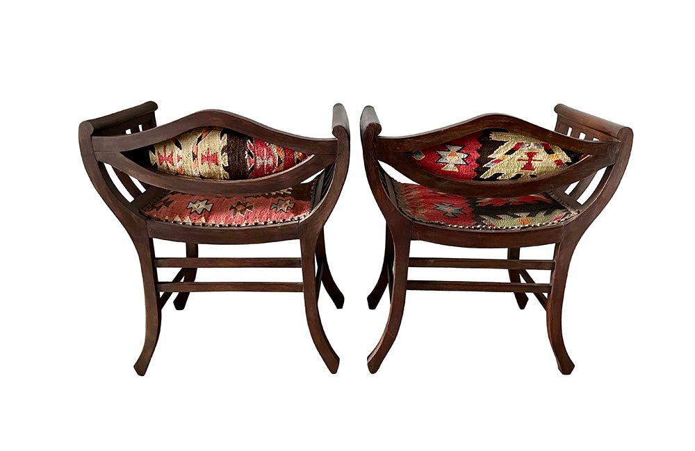 Stylish pair of early 20th century French armchairs studded and upholstered in Kilim. Circa 1920 in the Arts & Crafts Style. AD & PS Antiques