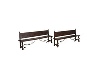 Pair of large Spanish oak benches with backs. Carved legs and decorative wrought iron stretchers.