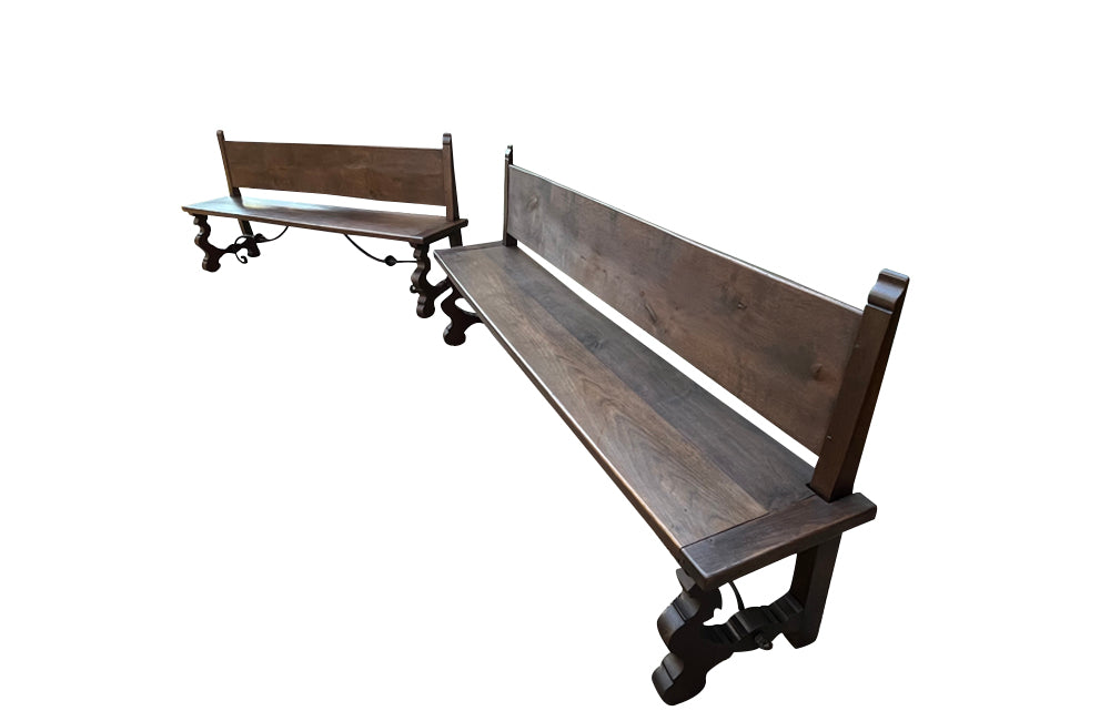 Pair of large Spanish oak benches with backs. Carved legs and decorative wrought iron stretchers.