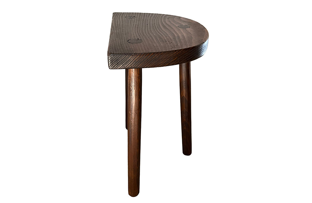 Pair of vintage demi lune tripod stools.