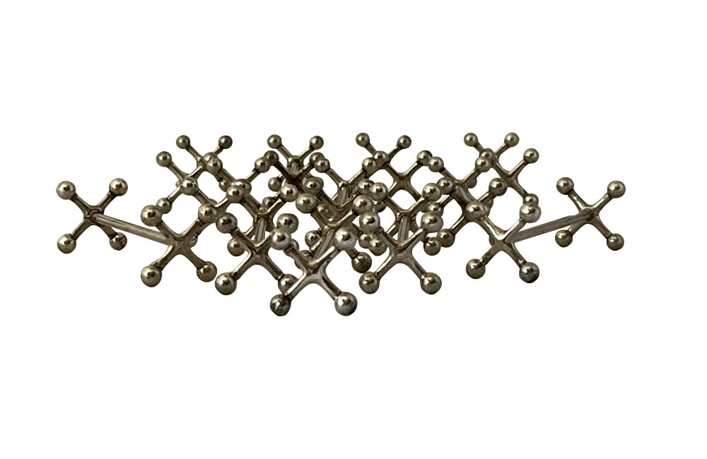 Stylish set of twelve art deco silverplate cutlery rests of simple and elegant design.