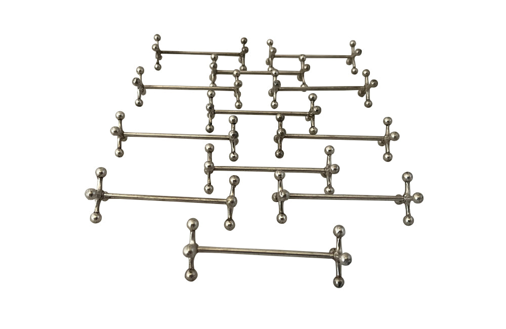 Stylish set of twelve art deco silverplate cutlery rests of simple and elegant design.