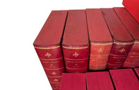 COLLECTION OF 85 RED LEATHER FAUX BOOK FILES