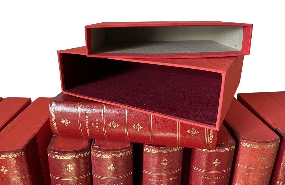 COLLECTION OF 85 RED LEATHER FAUX BOOK FILES