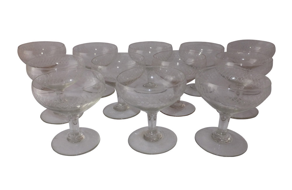 TWELVE ETCHED CHAMPAGNE COUPES
