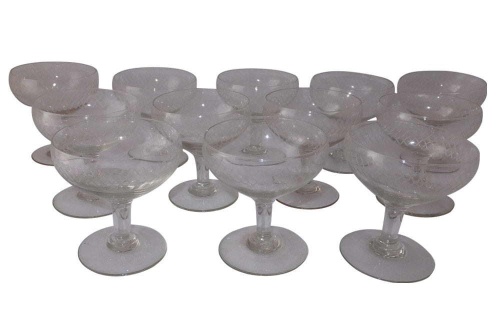 TWELVE ETCHED CHAMPAGNE COUPES