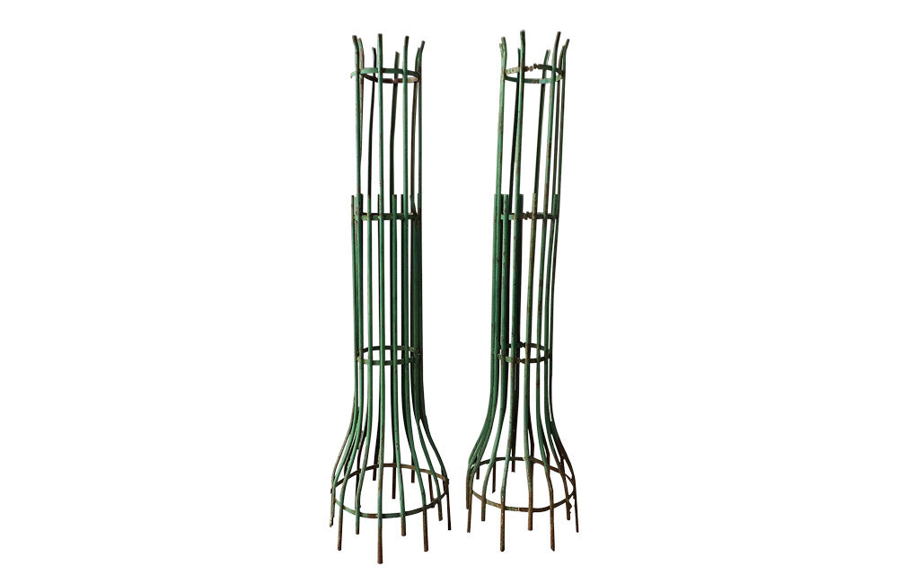 TWO PAIRS OF TREE GUARDS