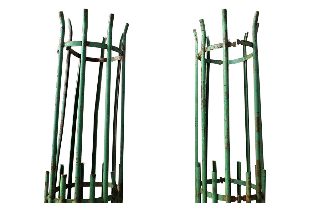 TWO PAIRS OF TREE GUARDS