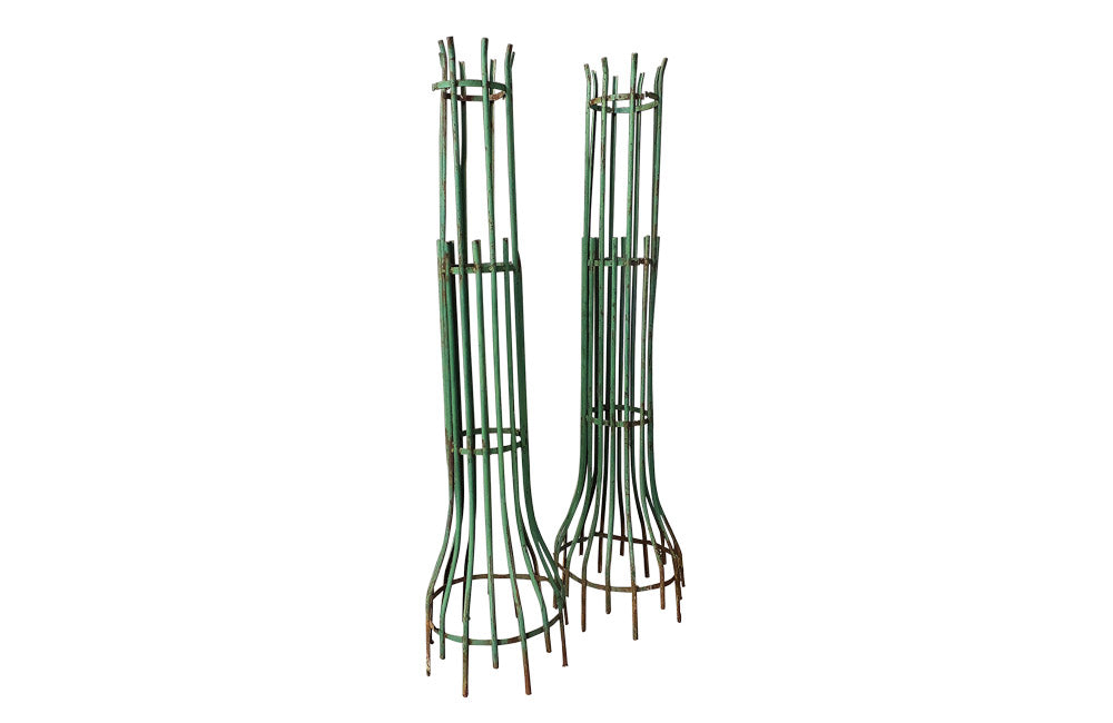 TWO PAIRS OF TREE GUARDS