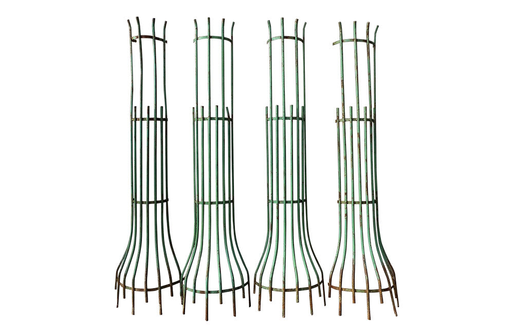TWO PAIRS OF TREE GUARDS