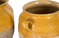 SET OF THREE YELLOW GLAZED CONFIT POTS