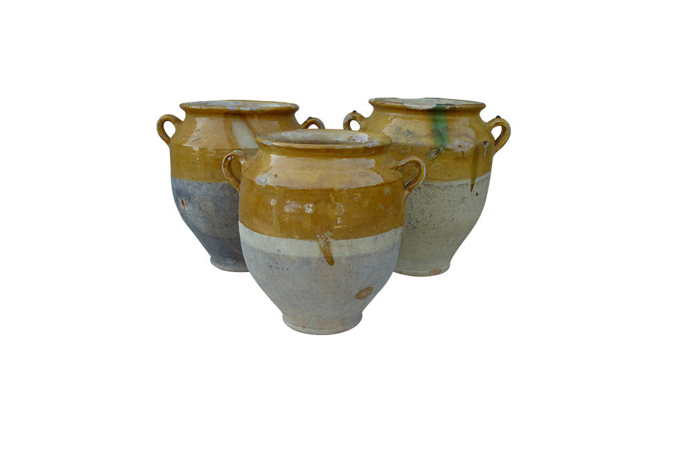 SET OF THREE YELLOW GLAZED CONFIT POTS