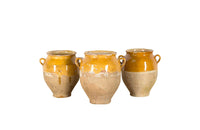 SET OF THREE YELLOW GLAZED CONFIT POTS