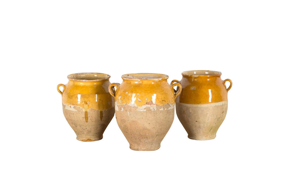 SET OF THREE YELLOW GLAZED CONFIT POTS