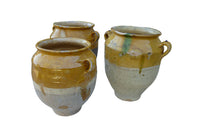 SET OF THREE YELLOW GLAZED CONFIT POTS