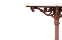 FRENCH CAST IRON GUERIDON WITH DRAGON MOTIFS