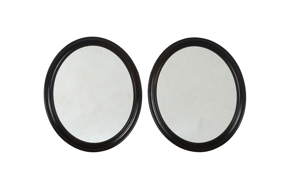 PAIR OF OVAL NAPOLEON III MIRRORS