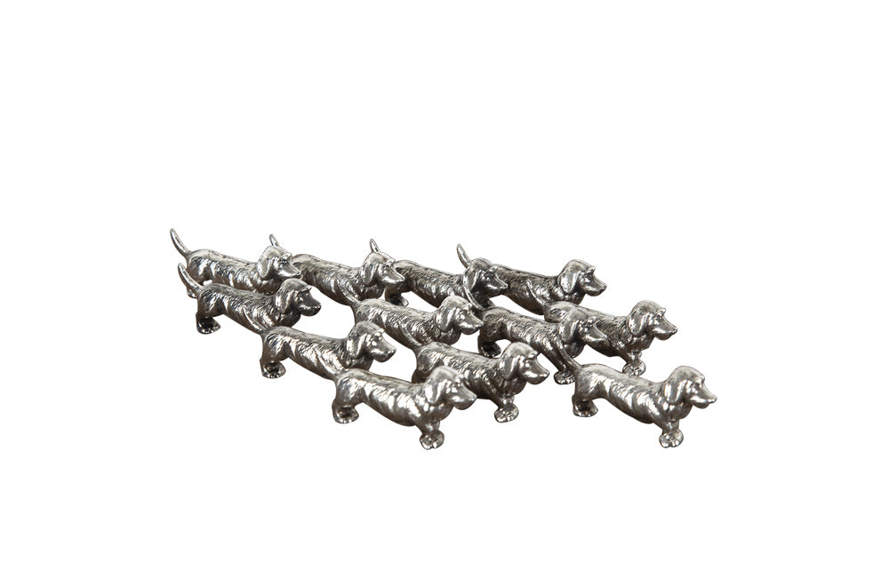 SET OF TWELVE DACHSHUND KNIFE RESTS
