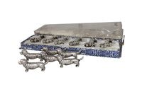 SET OF TWELVE DACHSHUND KNIFE RESTS