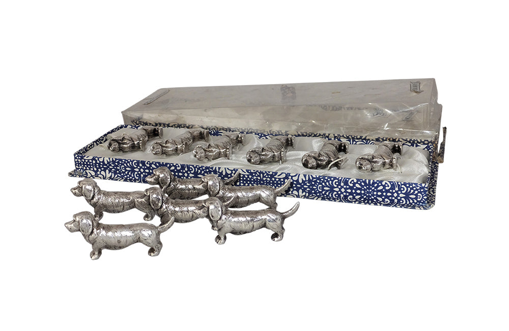 SET OF TWELVE DACHSHUND KNIFE RESTS