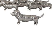 SET OF TWELVE DACHSHUND KNIFE RESTS