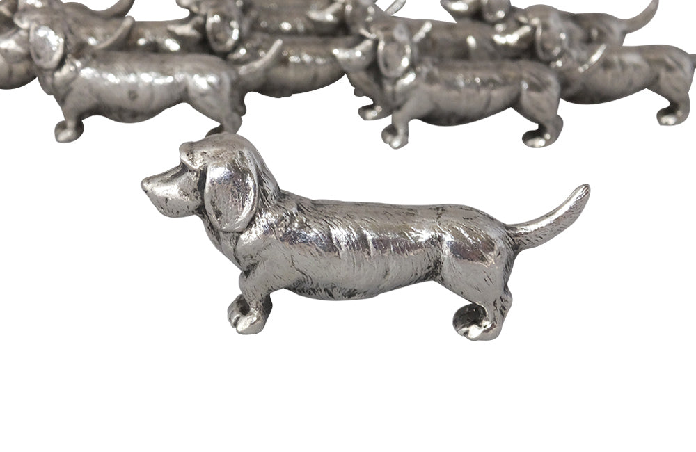SET OF TWELVE DACHSHUND KNIFE RESTS