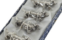 SET OF TWELVE DACHSHUND KNIFE RESTS