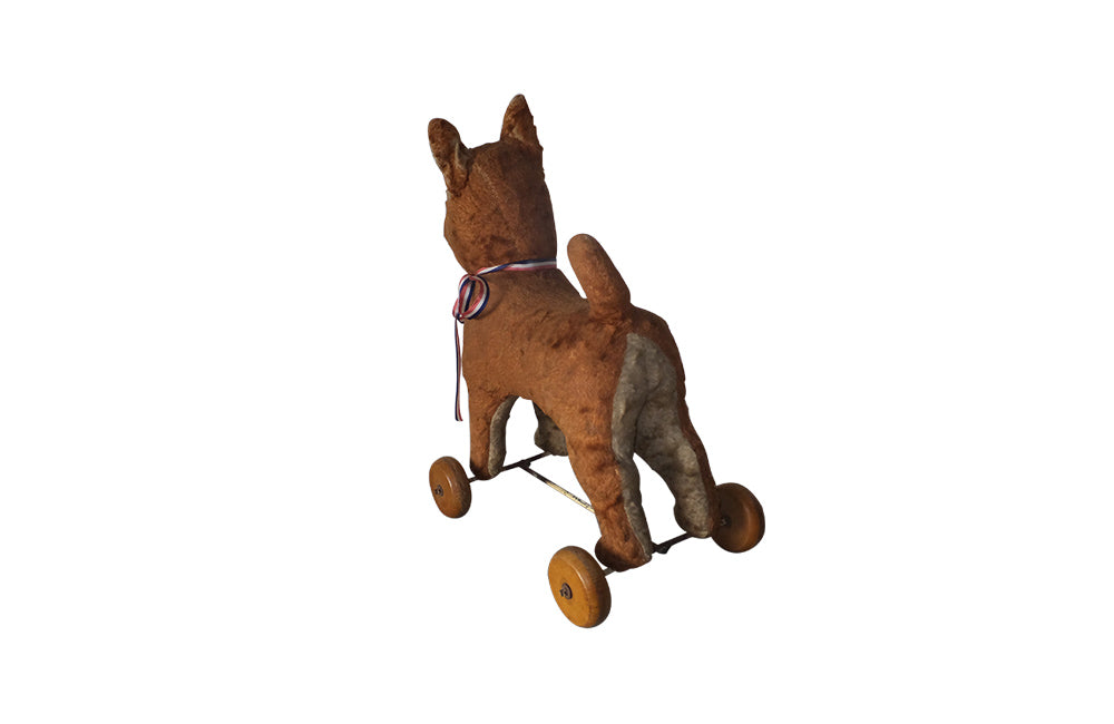 FRENCH ANTIQUE TOY DOG ON WHEELS