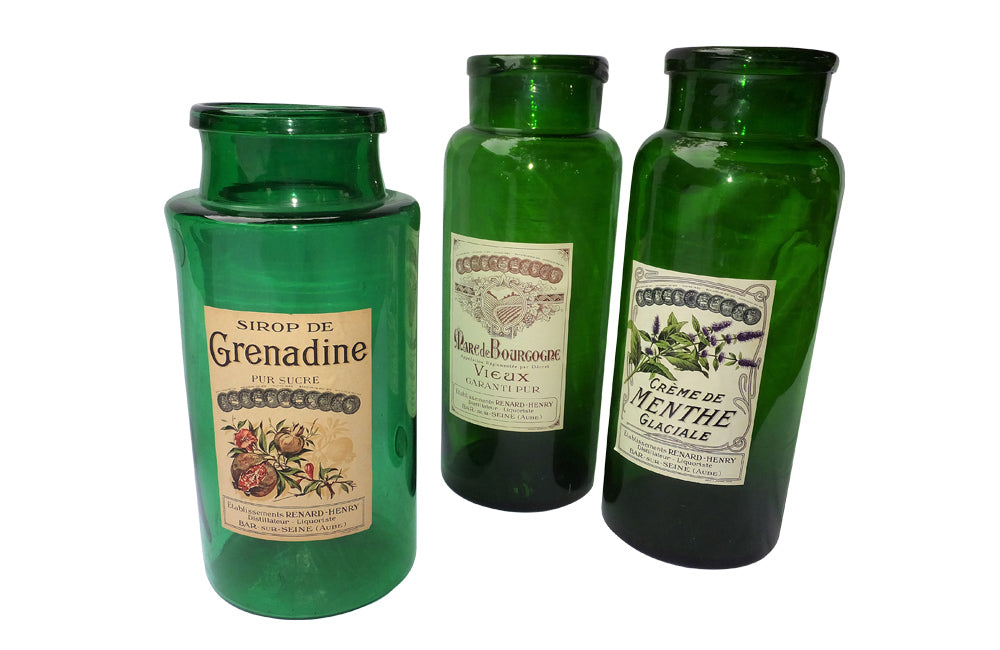 SET OF THREE GREEN GLASS STORAGE JARS