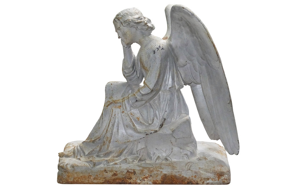 SEATED CAST IRON ANGEL STATUE