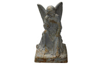 SEATED CAST IRON ANGEL STATUE