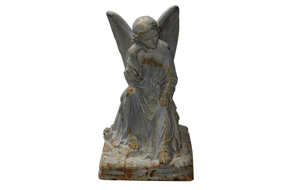SEATED CAST IRON ANGEL STATUE