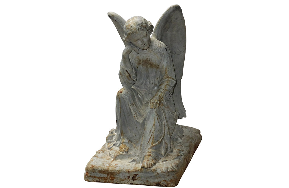 SEATED CAST IRON ANGEL STATUE