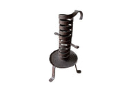 COLLECTION OF FIVE FRENCH IRON CELLAR CANDLESTICKS