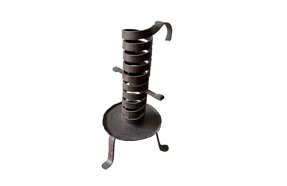 COLLECTION OF FIVE FRENCH IRON CELLAR CANDLESTICKS