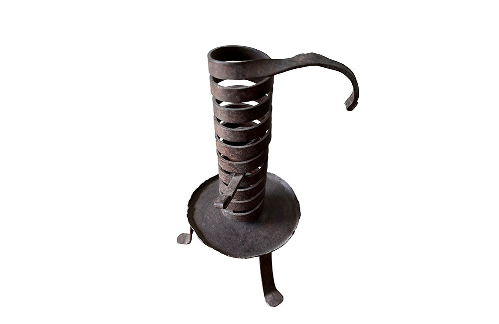 COLLECTION OF FIVE FRENCH IRON CELLAR CANDLESTICKS