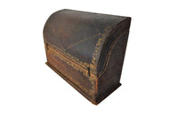Charming French lidded file box in lovely old worn leather with Neo-Classical embossed motifs, including swans and urns . The base bears the original retail label of Au Bon Marche.