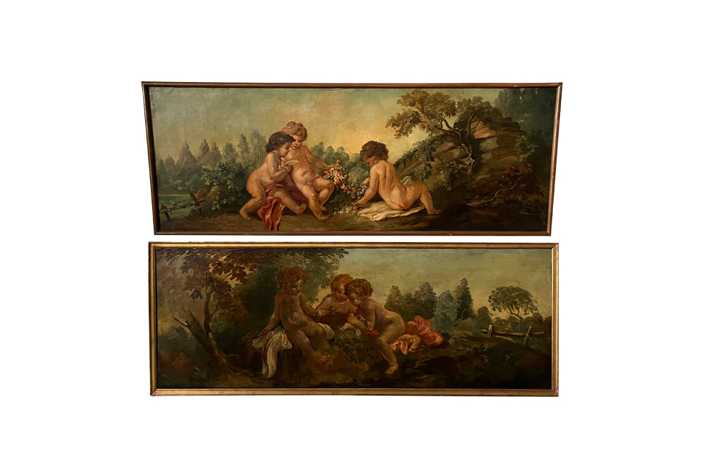 PAIR OF CHERUBIC OIL PAINTINGS