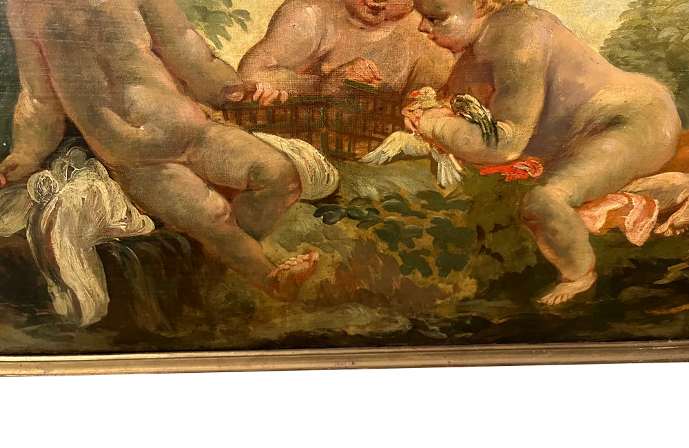 PAIR OF CHERUBIC OIL PAINTINGS