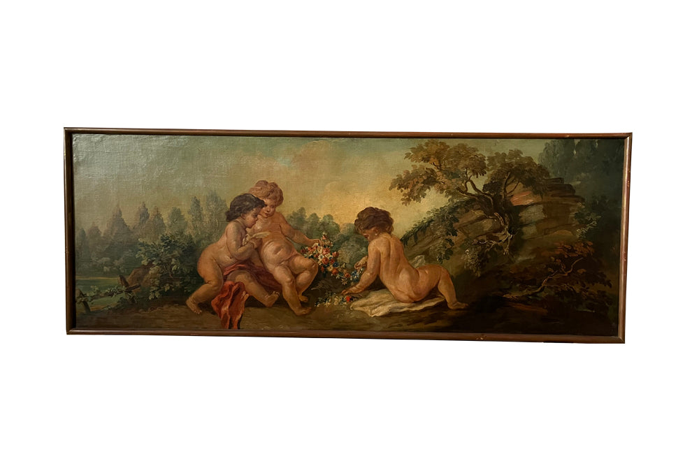 PAIR OF CHERUBIC OIL PAINTINGS
