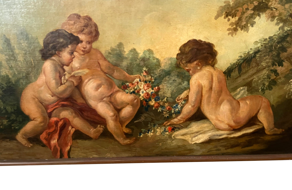 PAIR OF CHERUBIC OIL PAINTINGS