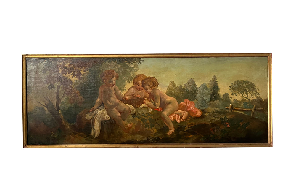 PAIR OF CHERUBIC OIL PAINTINGS