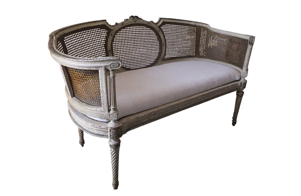 Louis XVI Revival Caned Banquette - Caned Canape - Cane and Linen Sofa - Neoclassical Revival -French Antiques - Antique Seating - Painted Antique Seating – Decorative Antique Furniture – French Antique Furniture - AD & PS Antiques
