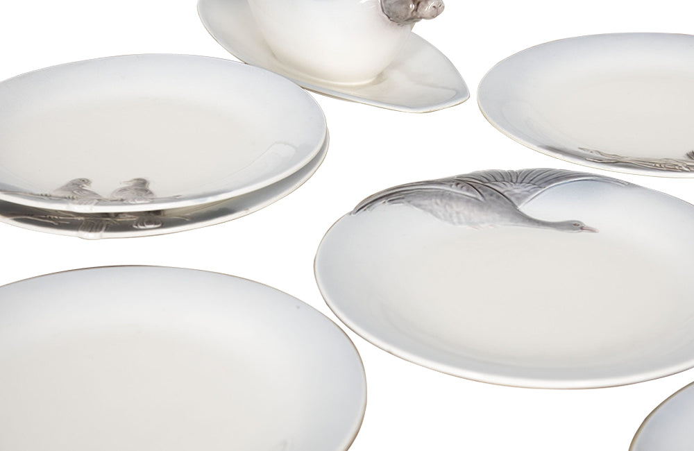 Geshutzt 1930's 13 piece game dinner service decorated with animals and birds - Decorative Antiques