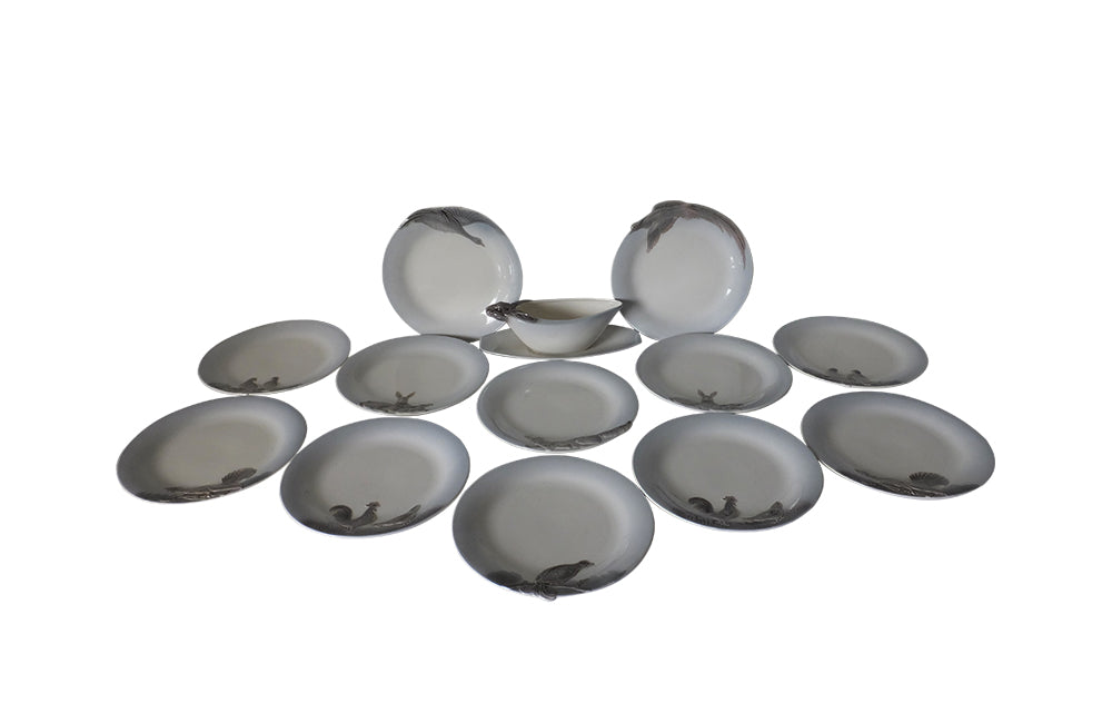 Geshutzt 1930's 13 piece game dinner service decorated with animals and birds - Decorative Antiques