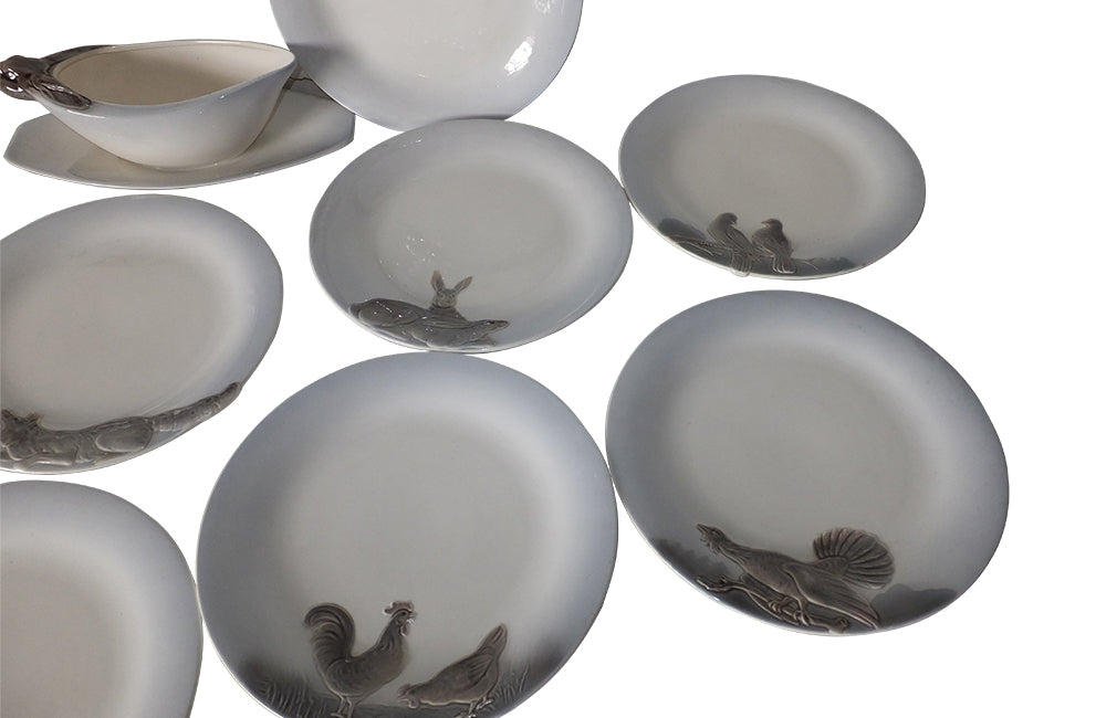 Geshutzt 1930's 13 piece game dinner service decorated with animals and birds - Decorative Antiques