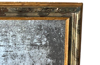 Antique mirror with polychrome frame from the Piedmont region. Italian. With beautiful heavily foxed mirror.