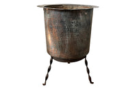 Beautiful 18th century French hammered and riveted copper vat on a later iron stand.