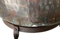 Beautiful 18th century French hammered and riveted copper vat on a later iron stand.